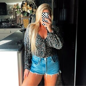 Black and orange floral cropped blouse